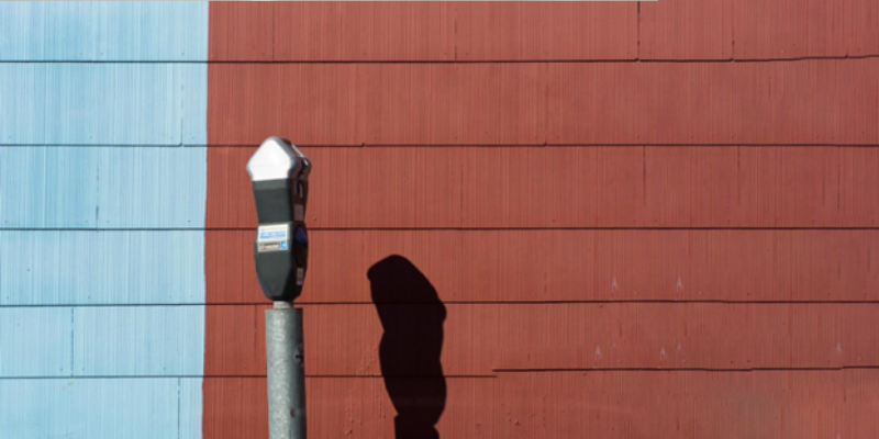 Parking meter sun shadow