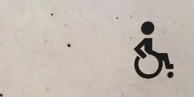 handicapped logo on cement