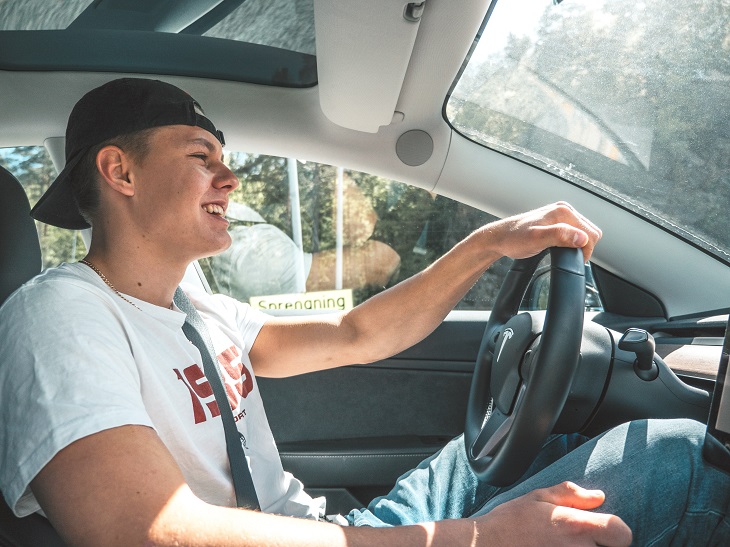 man driving vehicle