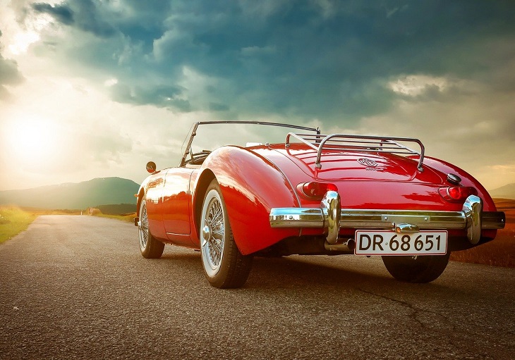 vintage car on the road in summer