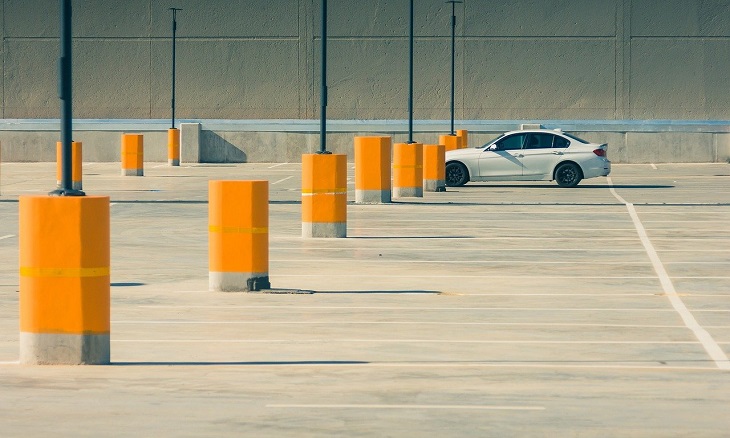 single car in parking lot