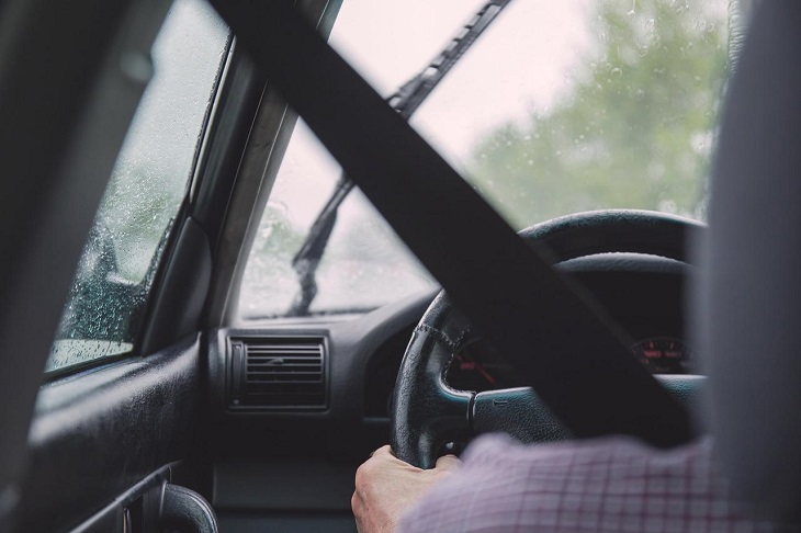 person behind the wheel